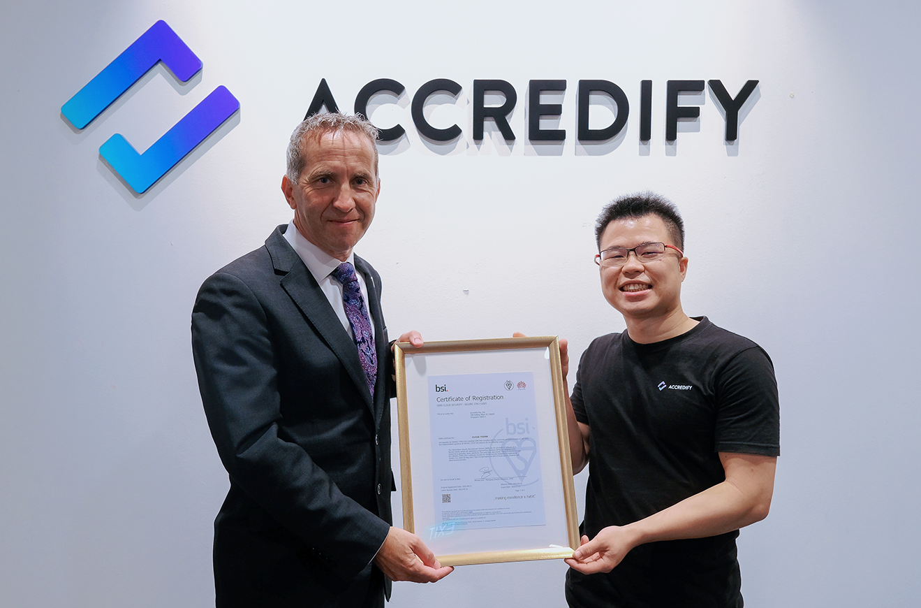 David Mudd, Global Head of Digital Trust Assurance at BSI, handing over the ISO 27017 and ISO 27018 certificate to Accredify's Co-Founder and Chief Risk Officer, Edmund Chew.